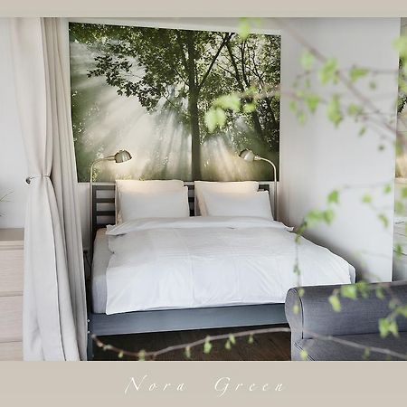 Nora Green Nida Room photo